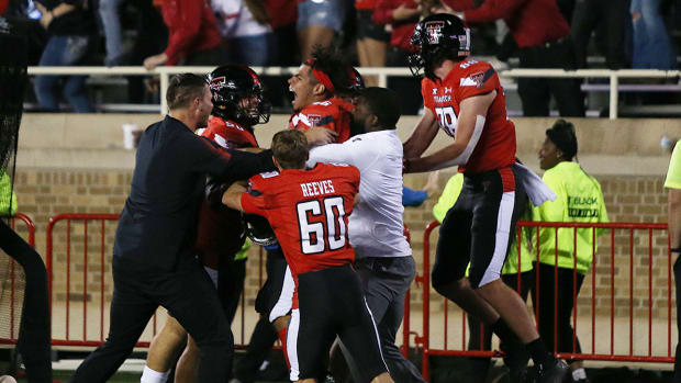 Texas Tech players celebrate win.